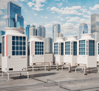 Mistubishi Electric HVAC on a city rooftop with a sunny sky.